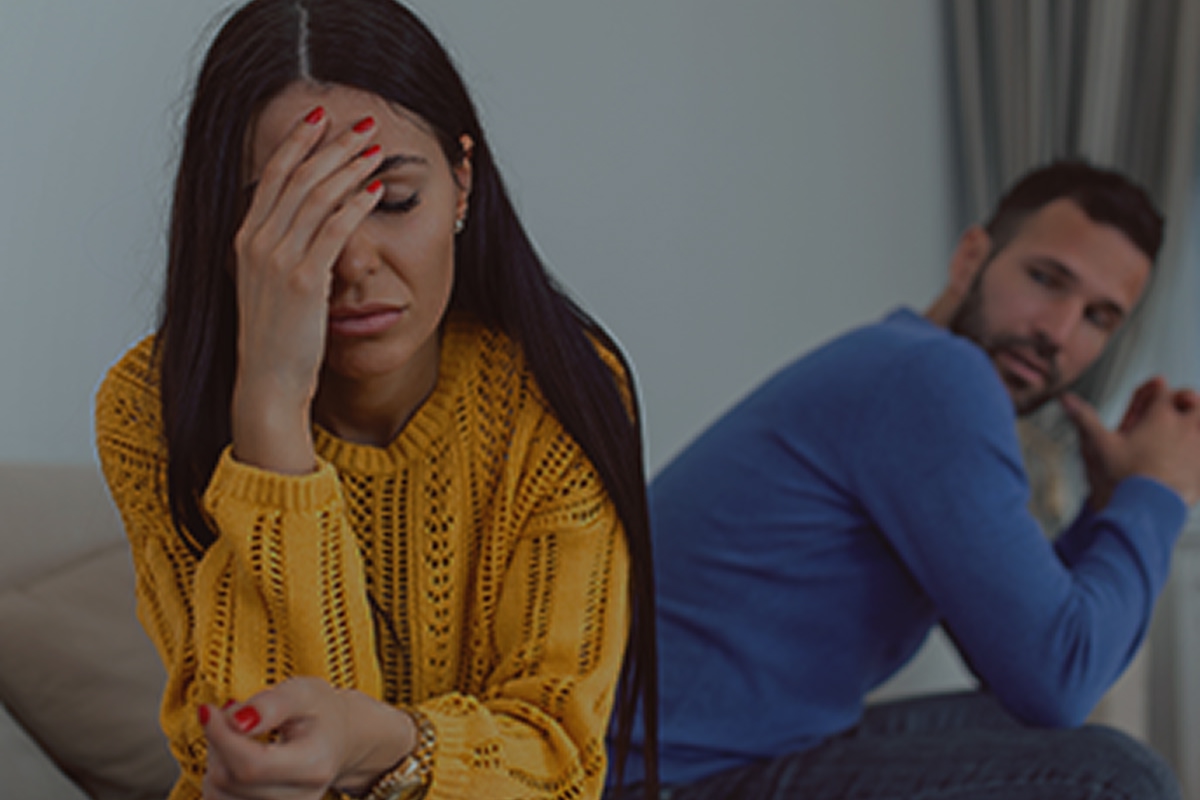 Image showing a distressed couple, highlighting depression symptoms, emotional strain, and how mental health issues can impact relationships.