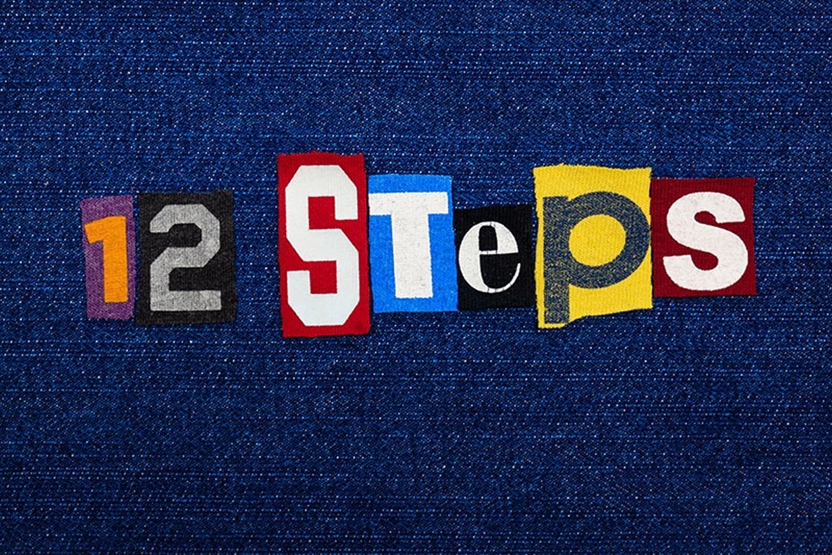 Graphic displaying the phrase “12 Steps” in colorful cut-out style letters, representing the 12-step recovery program used in Alcoholics Anonymous.